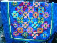 How to quilt this one?  Suggestions?  Stitch in ditch only, or ?