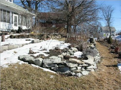 this bed is on the west side of the 2nd set of steps I put in last fall - this looks from the west end of the bed to the east